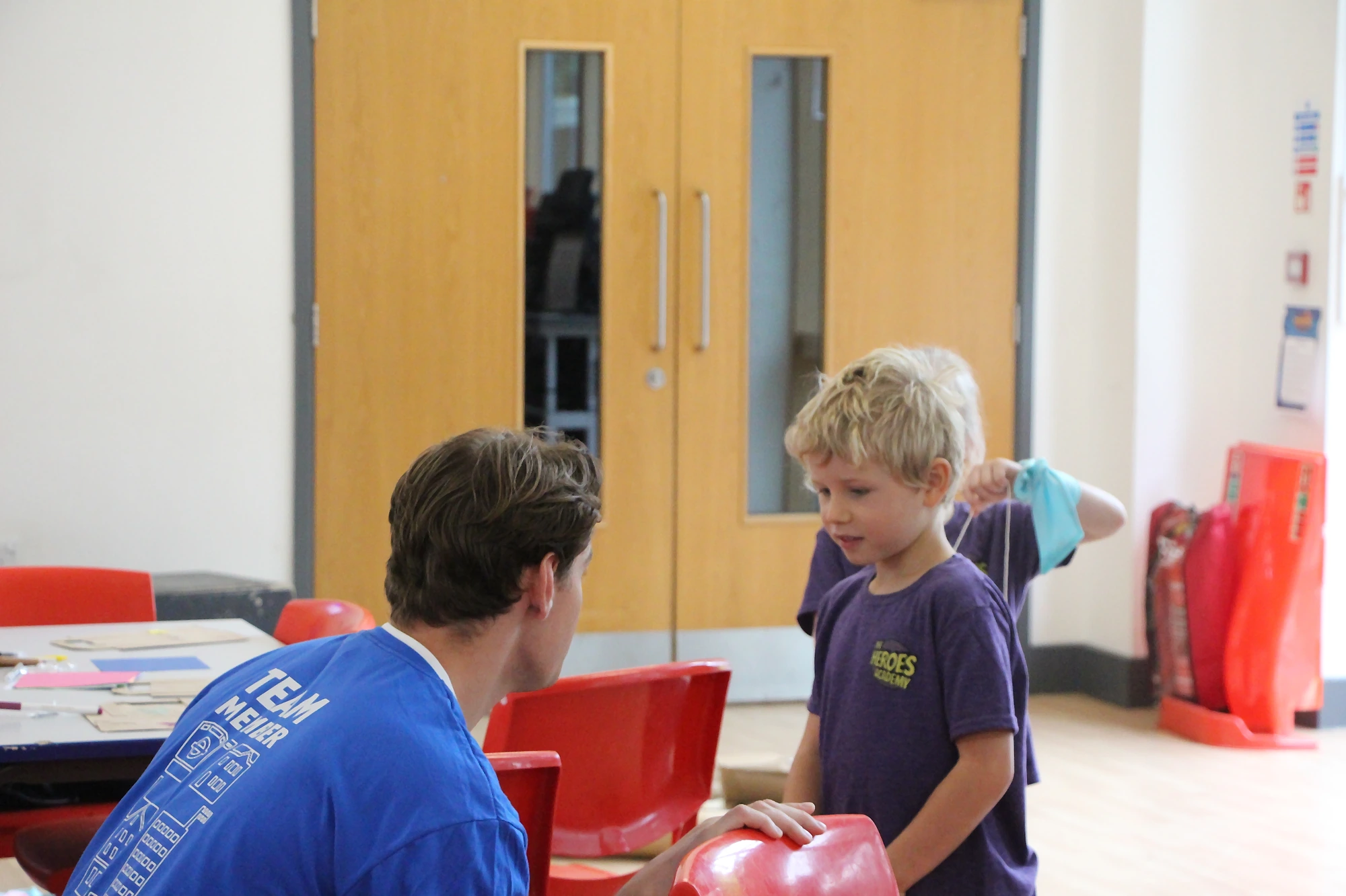 A volunteer helping at a Christ Church Balham holiday club