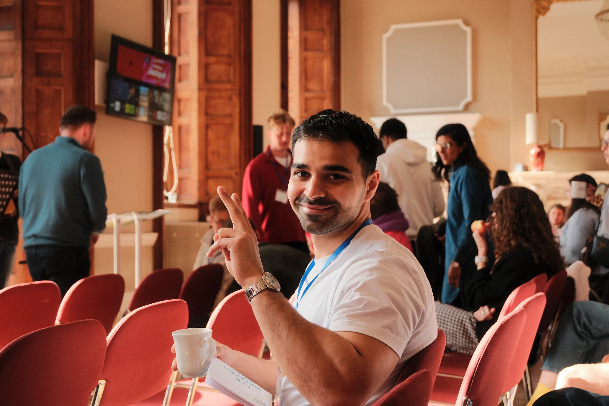 A greeter welcoming people at a Christ Church Balham gathering